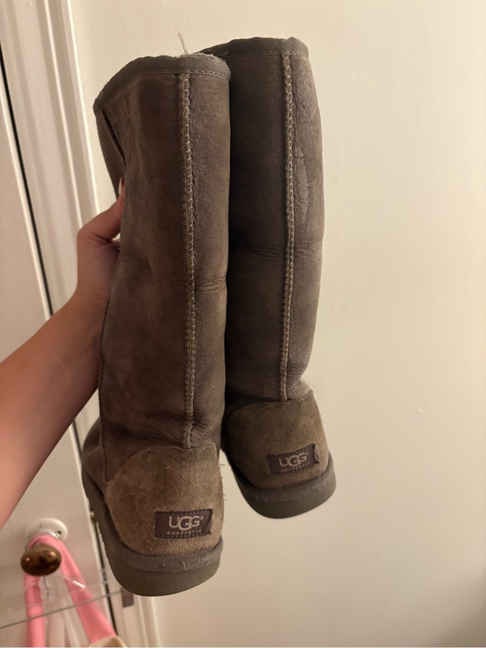 Very used pair of grey Uggs